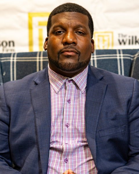 Daryan Wilkinson, seated