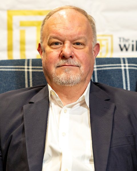 James "Matt" Lewis, Esq., seated